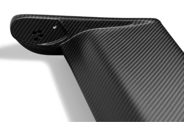 Underside view of MUSE Dry Carbon Main Wing - Skyline GT-R BNR34, highlighting aerodynamic shape and dry carbon finish.