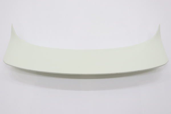 Unpainted rear spoiler from VEILSIDE Aero Kit for FFZ400 RZ34, designed for enhanced aerodynamics and styling.