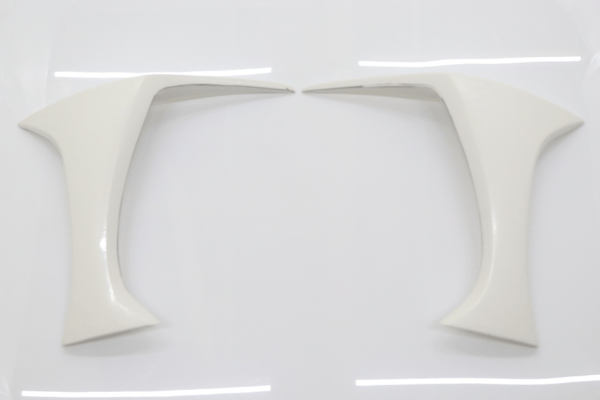 Pair of front fender vents from VEILSIDE Aero Kit for FFZ400 RZ34, adding aggressive styling and airflow.