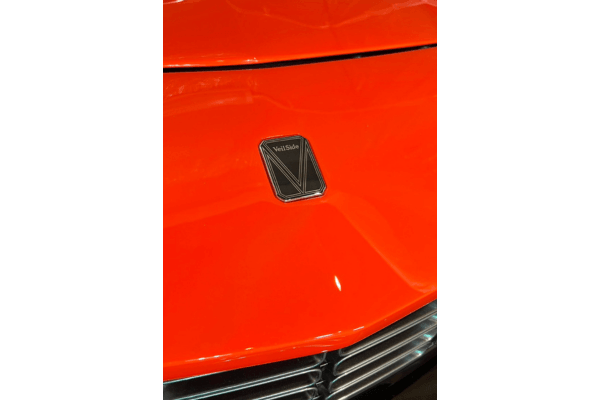 Close-up of VEILSIDE emblem on the hood of FFZ400 RZ34, highlighting the custom branding detail of the aero kit.