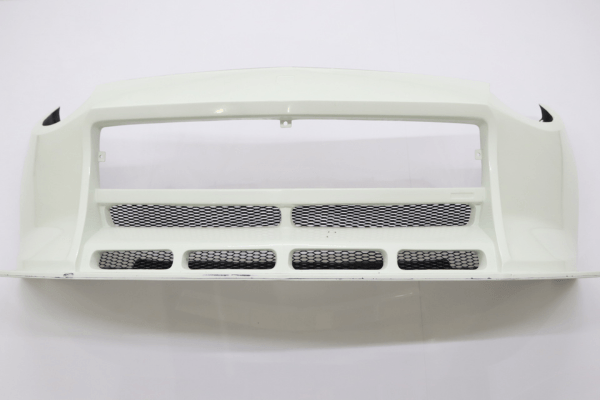 Unpainted hood panel from VEILSIDE Aero Kit for FFZ400 RZ34, designed with sculpted lines for performance and aesthetics.