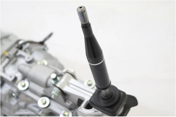 Gear shifter detail of TOYOTA 5 Speed Manual Transmission R154 for JZX100 Chaser Mark II, showcasing shift lever design.