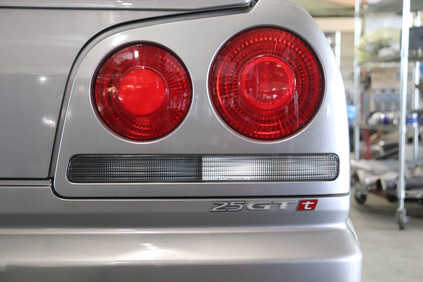 Эмблема NISSAN 25GTt - Skyline R34 ER34 #663231429