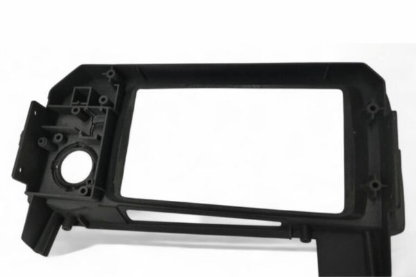 Rear view of GRID RACING MFD Front Panel Finisher for Skyline BNR34 GTR, highlighting mounting points and structural design for secure fitment.