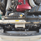 Engine bay view of Skyline BNR34 with FUJITSUBO EXH+ Hood Support mounted, highlighting titanium rod placement and compatibility.