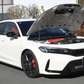FUJITSUBO EXH+ Hood Support installed on a white Civic Type R FL5 with hood open, showcasing titanium burnt color gradation support rod.