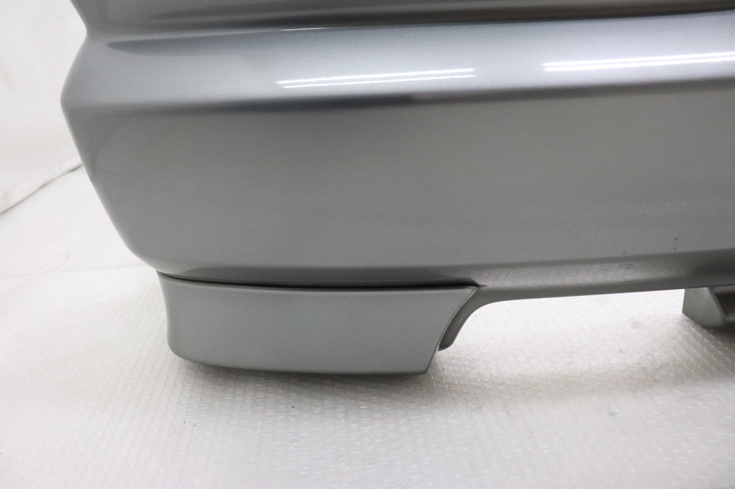 [USED] NISSAN Rear Bumper with Under Spoiler – Skyline ER34 25GT Turbo (Late Model) 4-Door #1100333121